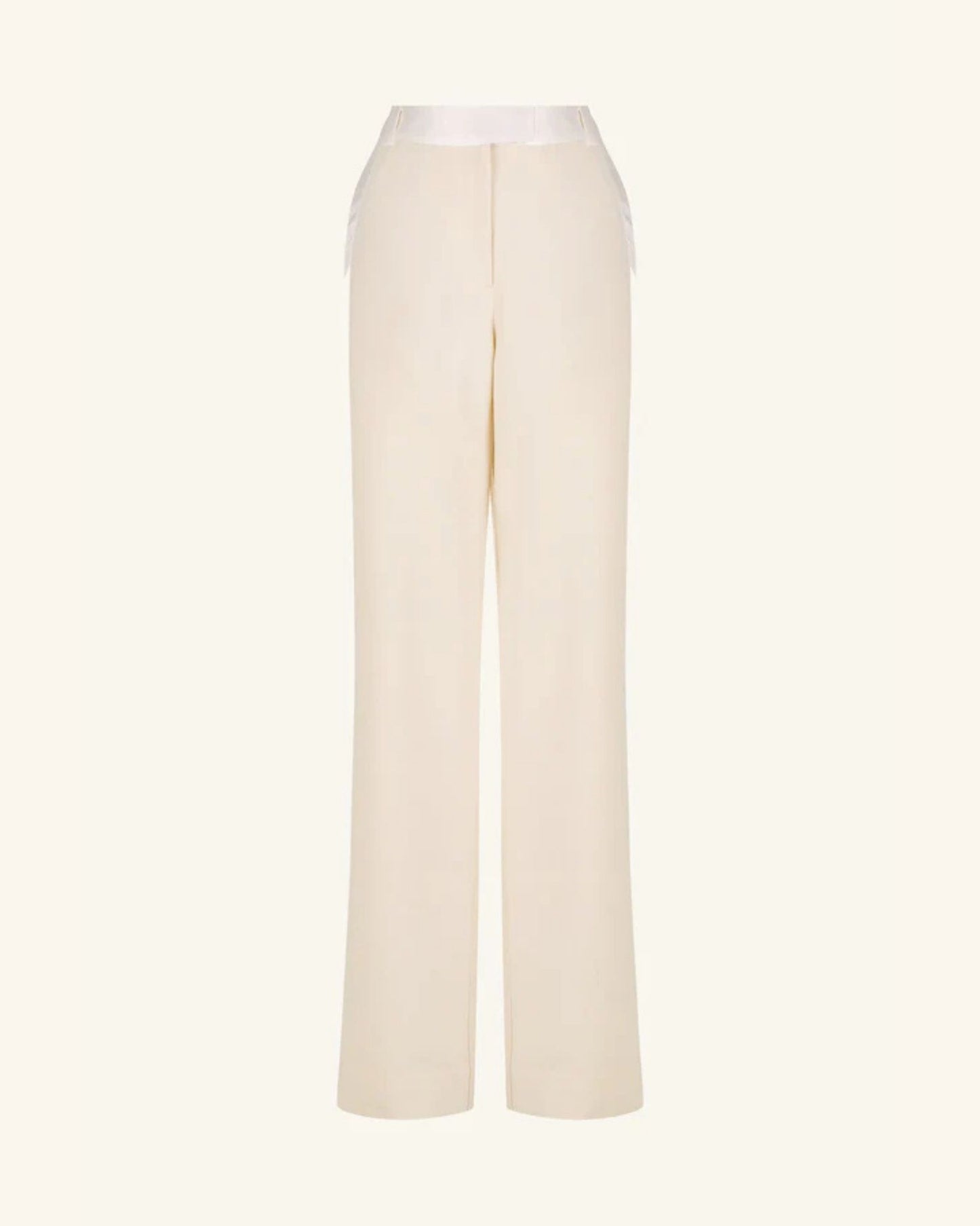 Product shot, Adri Tuxedo Side Panel Pants with a contrast satin waistband, side panels, and pockets. Features include a mid-rise fit, knife pleats, jet pockets, and a relaxed straight leg. Available at Georgette bridal boutique in Brussels and online at georgettebridal.com.