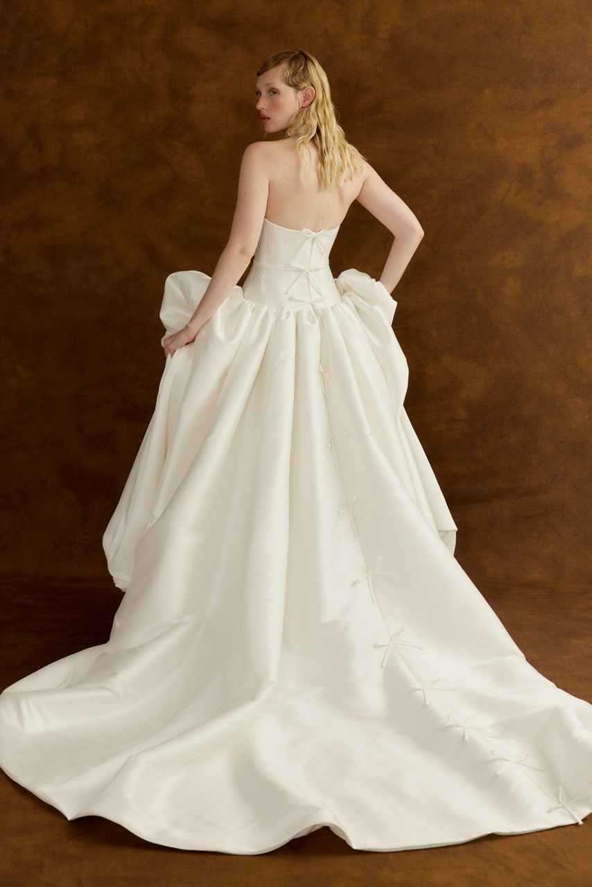 Bride wearing Lyn wedding dress with full Mikado skirt by Floure available at Georgette bridal Brussels