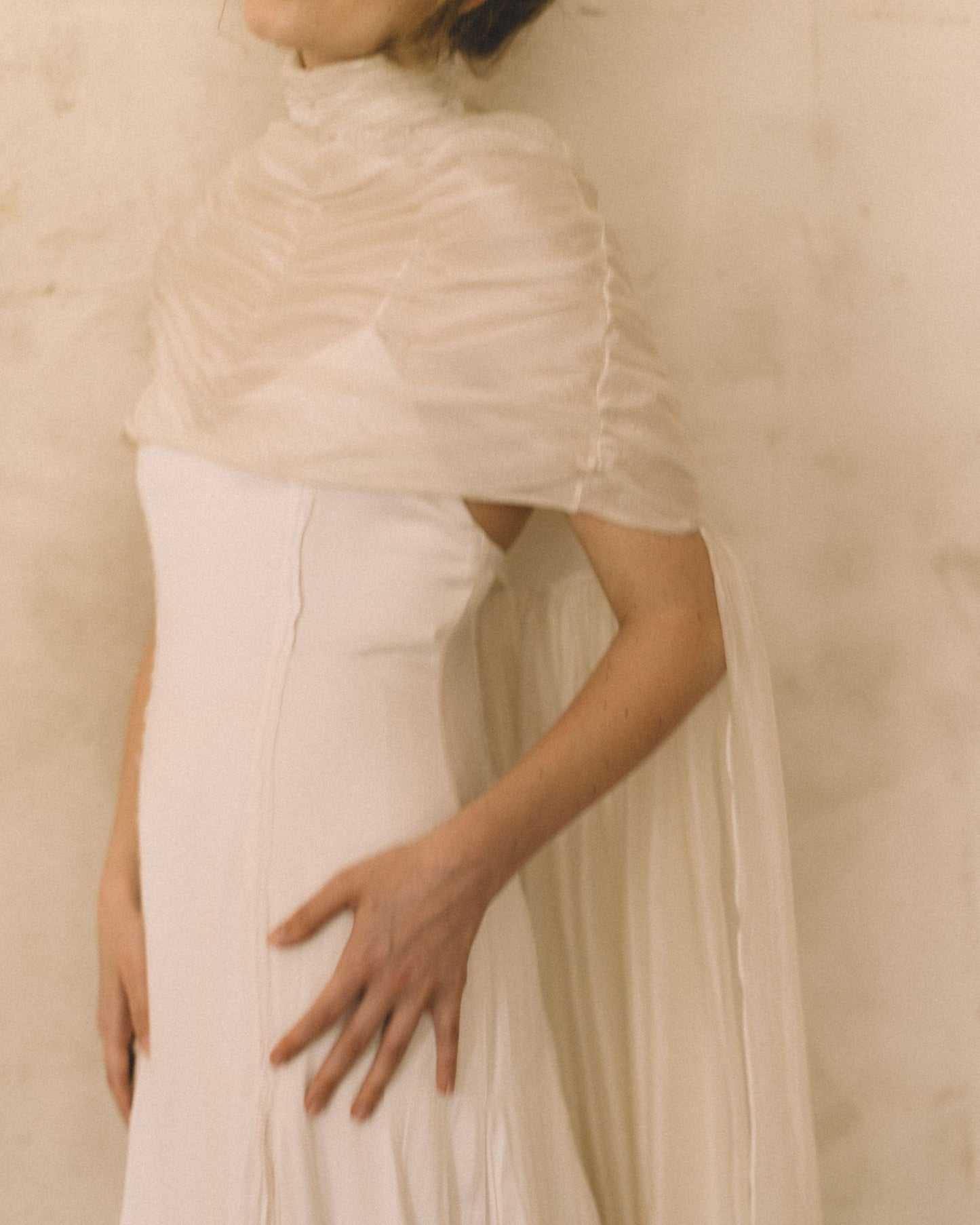 Close-up of the Elise Cape 100% Silk Tule by The Muse Collective handmade in Spain available at Georgette in Brussels and online