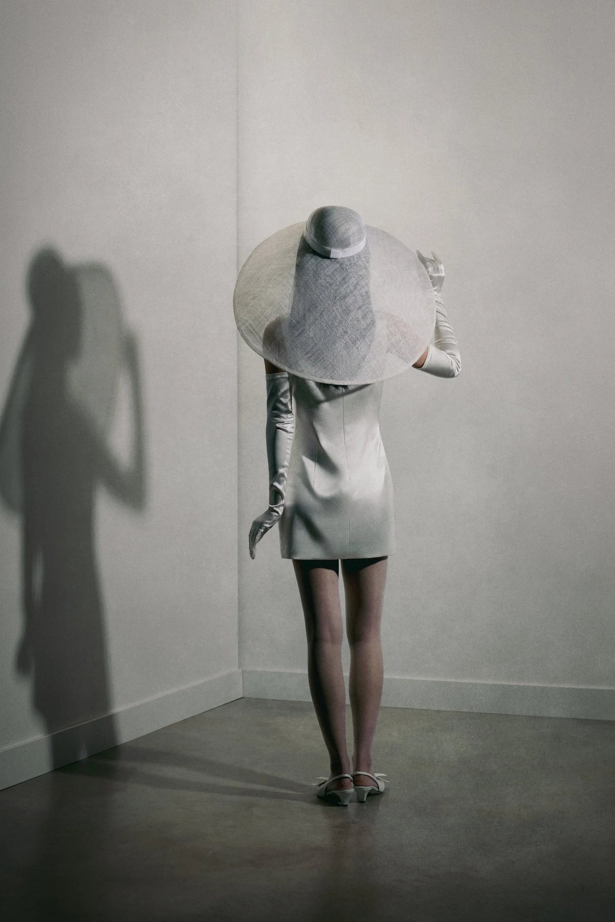 Back view of La sixième silk mini wedding dress with concealed zipper by Blanc Wear available at Georgette bridal Brussels