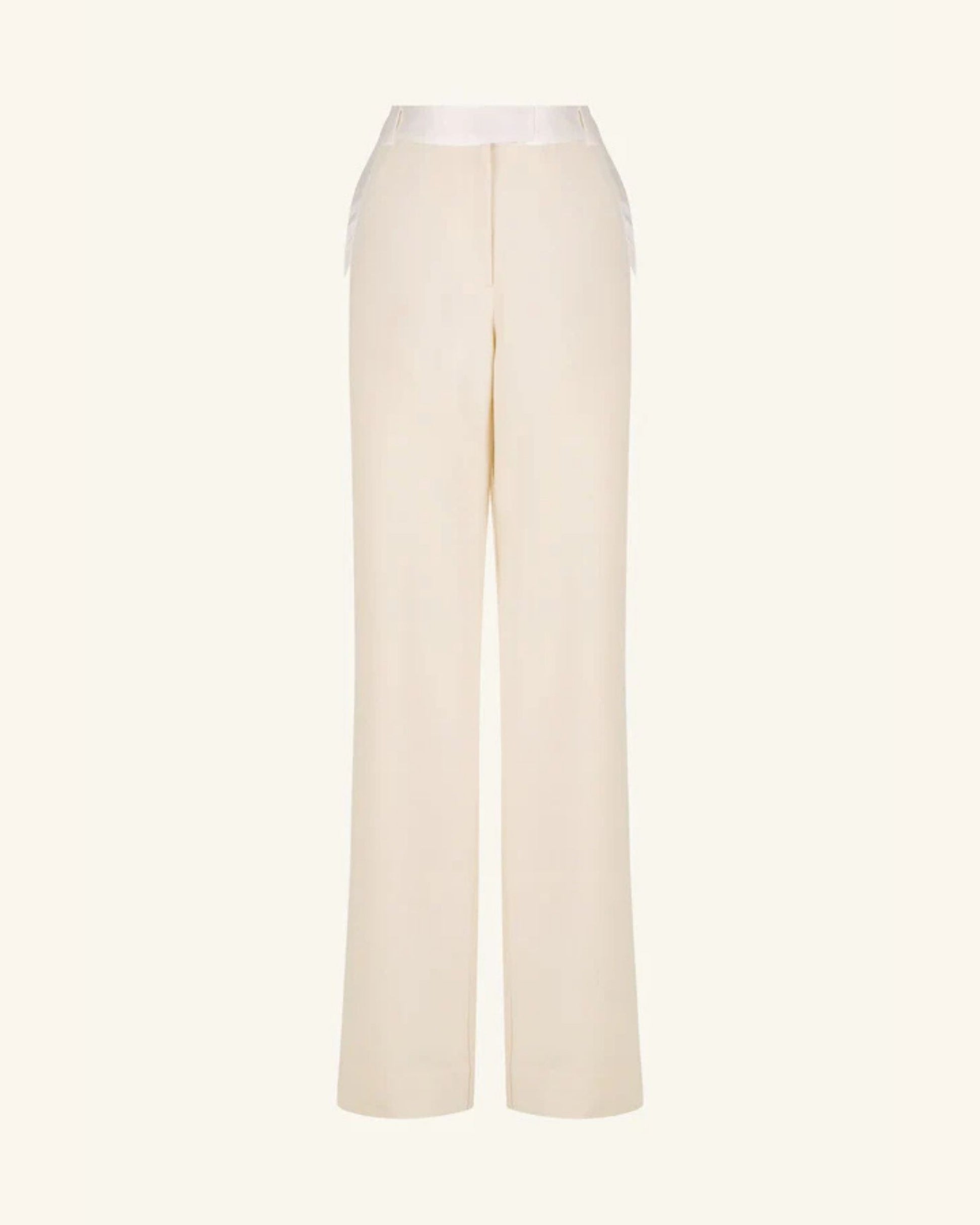 Product shot, Adri Tuxedo Side Panel Pants with a contrast satin waistband, side panels, and pockets. Features include a mid-rise fit, knife pleats, jet pockets, and a relaxed straight leg. Available at Georgette bridal boutique in Brussels and online at georgettebridal.com.
