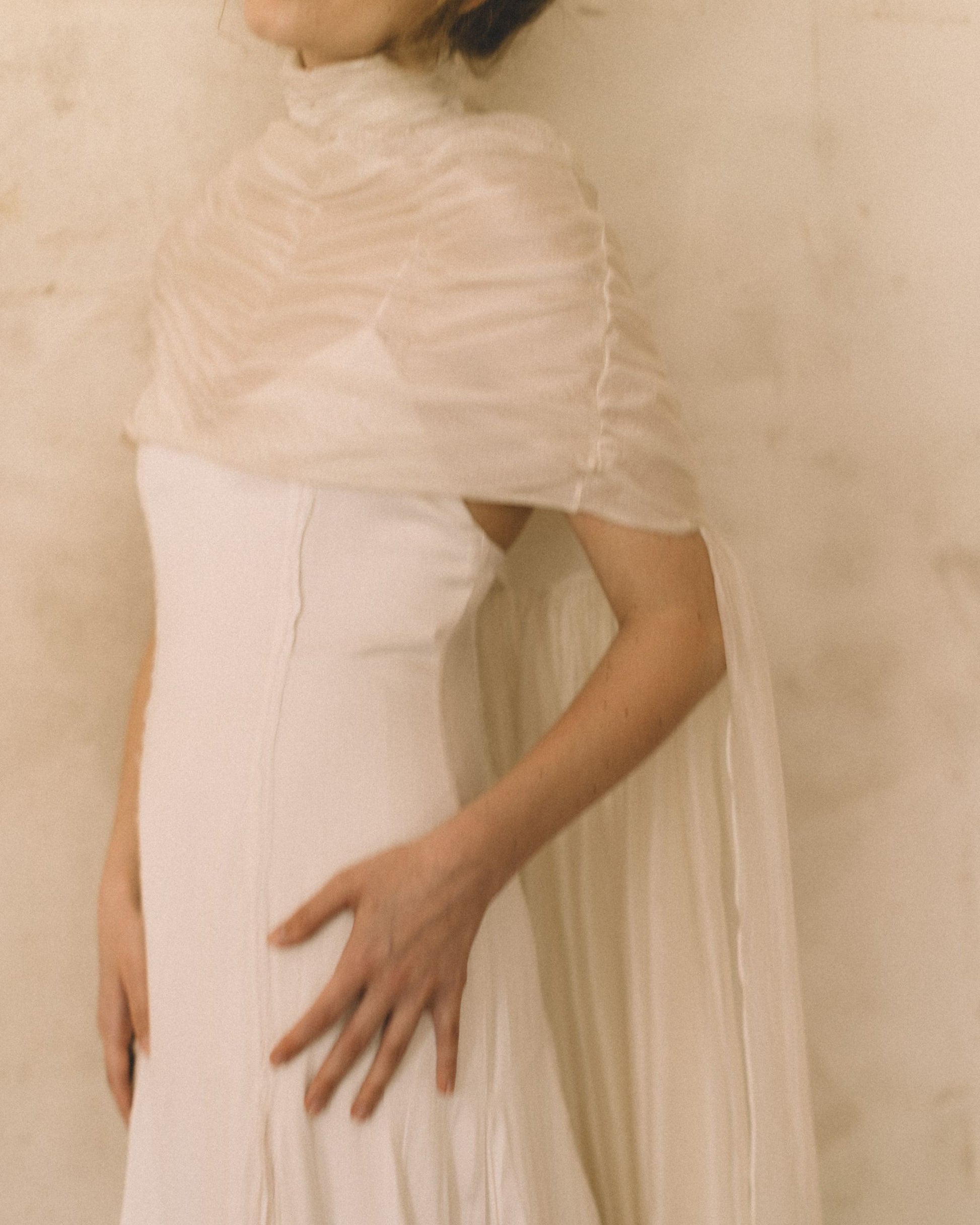 Close-up of the Elise Cape 100% Silk Tule by The Muse Collective handmade in Spain available at Georgette in Brussels and online