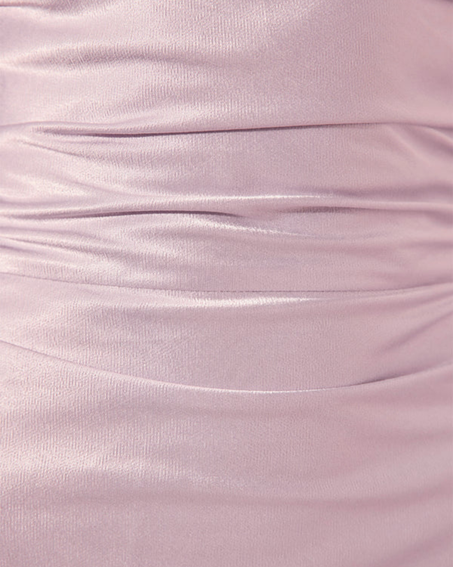 Close-up of lilac satin fabric showing ruching and light-reflecting texture of the La Lune Cross Back Maxi Dress in Lilac.