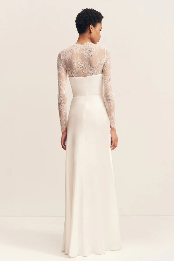 Back view of the Lambent Lace Long Sleeve Bridal Bodysuit with intricate lace detailing and a high neckline, offering a timeless and sophisticated bridal look. Available at Georgette bridal boutique in Brussels and online at georgettebridal.com.