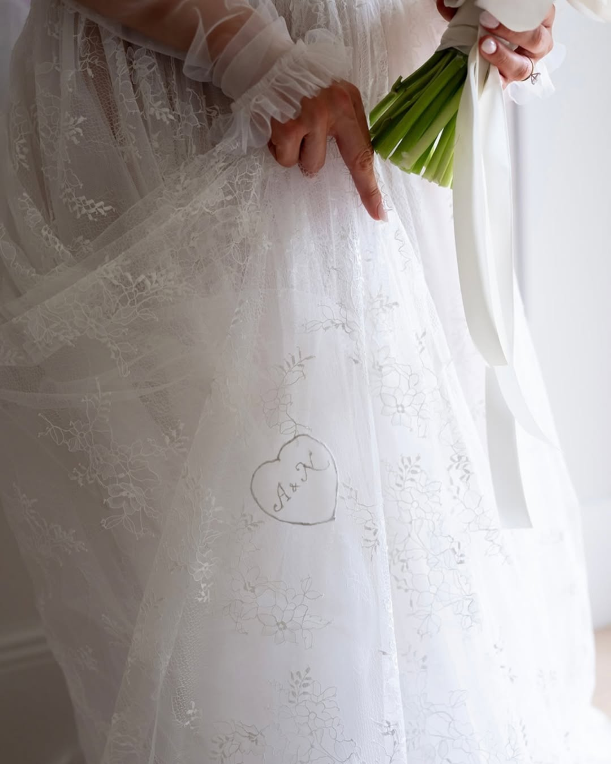 Personalized engraving on Calla luxury lace wedding dress by Floure available at Georgette bridal Brussels