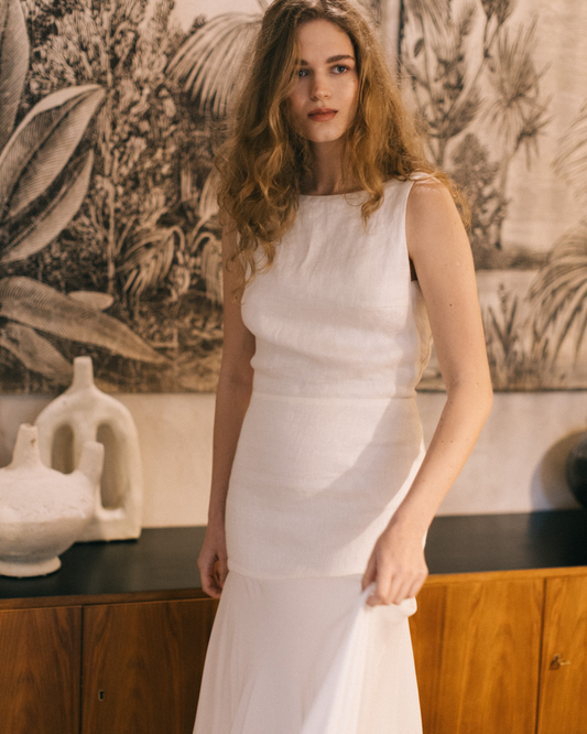 Model posing with the Sintra Wedding  Dress by The Muse Collective available at Georgette Bridal Store in Brussels 